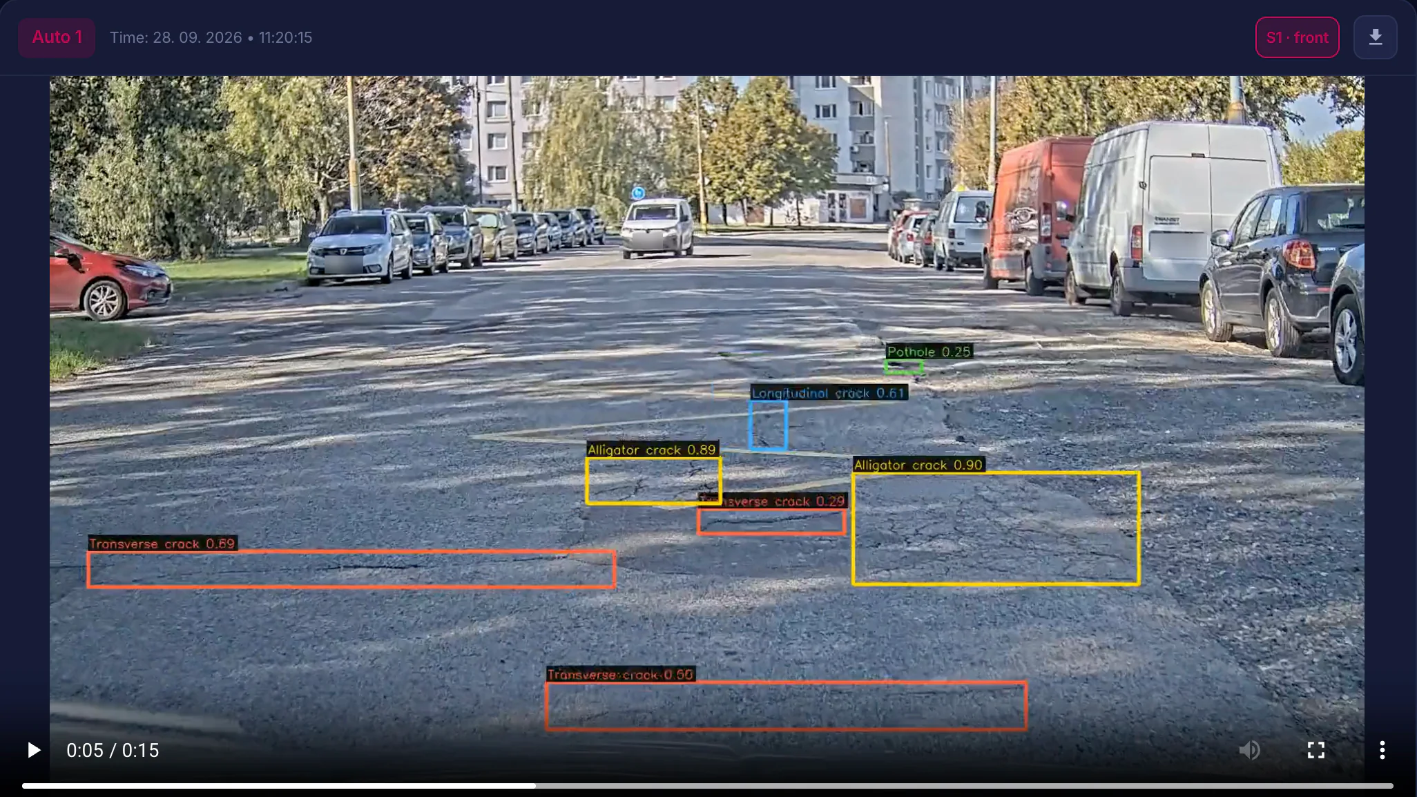 The camera view in the CAMAN console, with cracks and a pothole labelled
